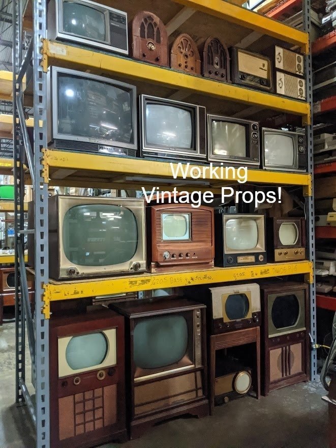 televisions on a rack props